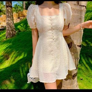 Small mini dress. Brand new. Off white color.